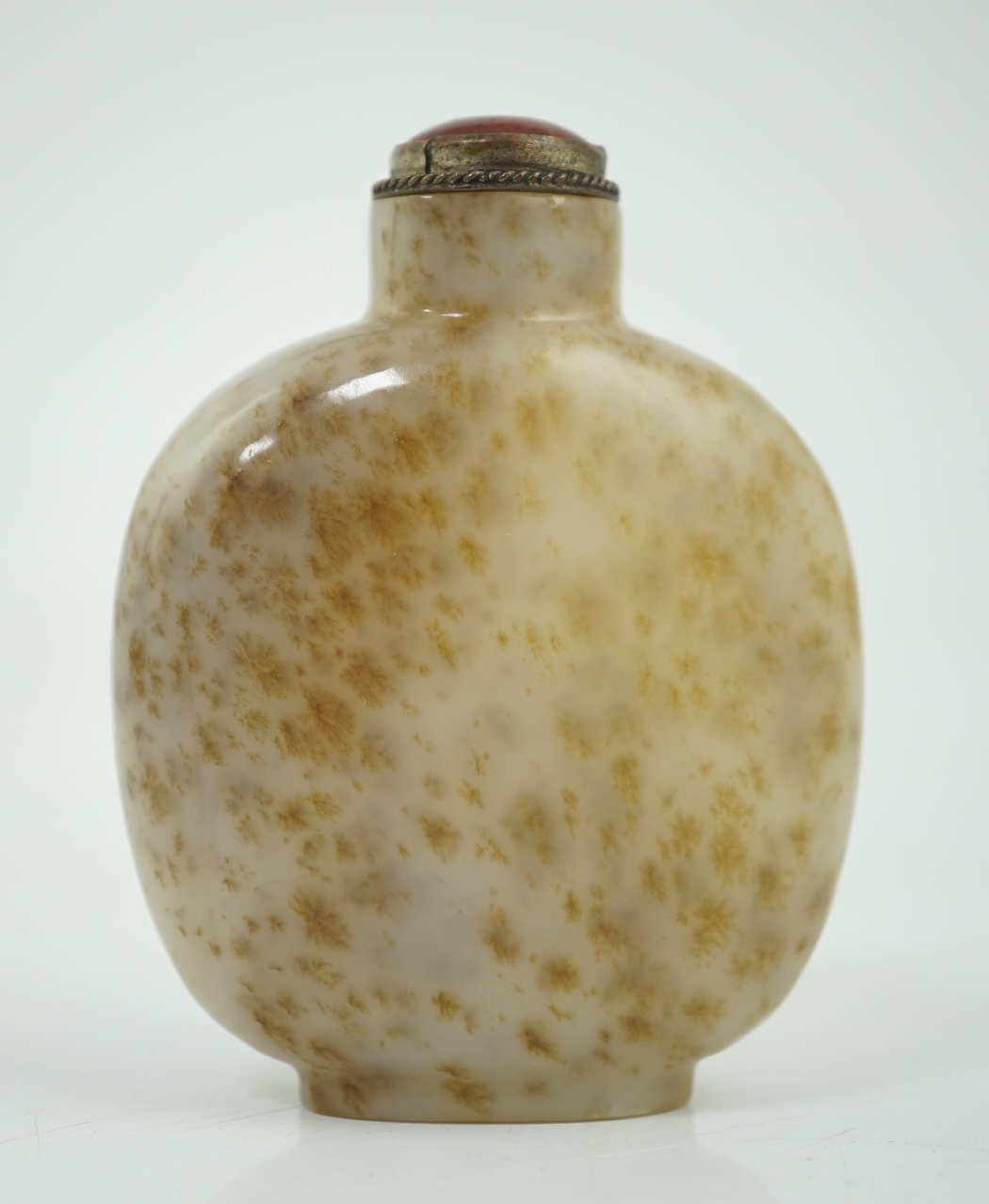A Chinese white and russet mottled jade snuff bottle, 18th/19th century